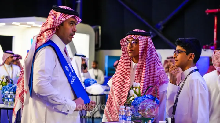 Guests networking during an evening event