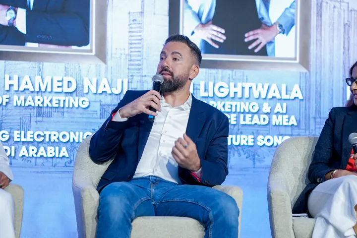 Corporate conference speaker during a panel discussion
