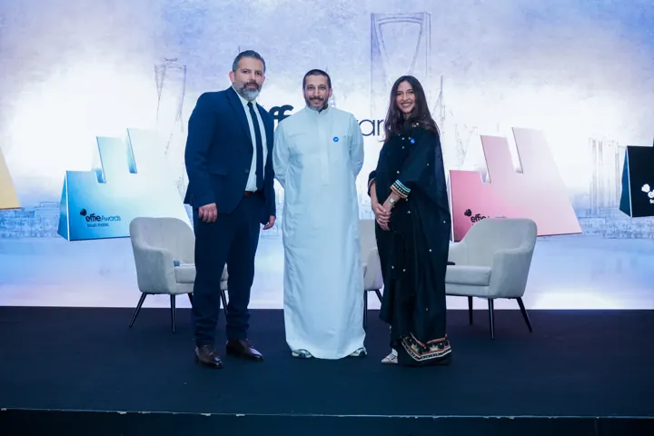 Corporate guests photographed at an awards event