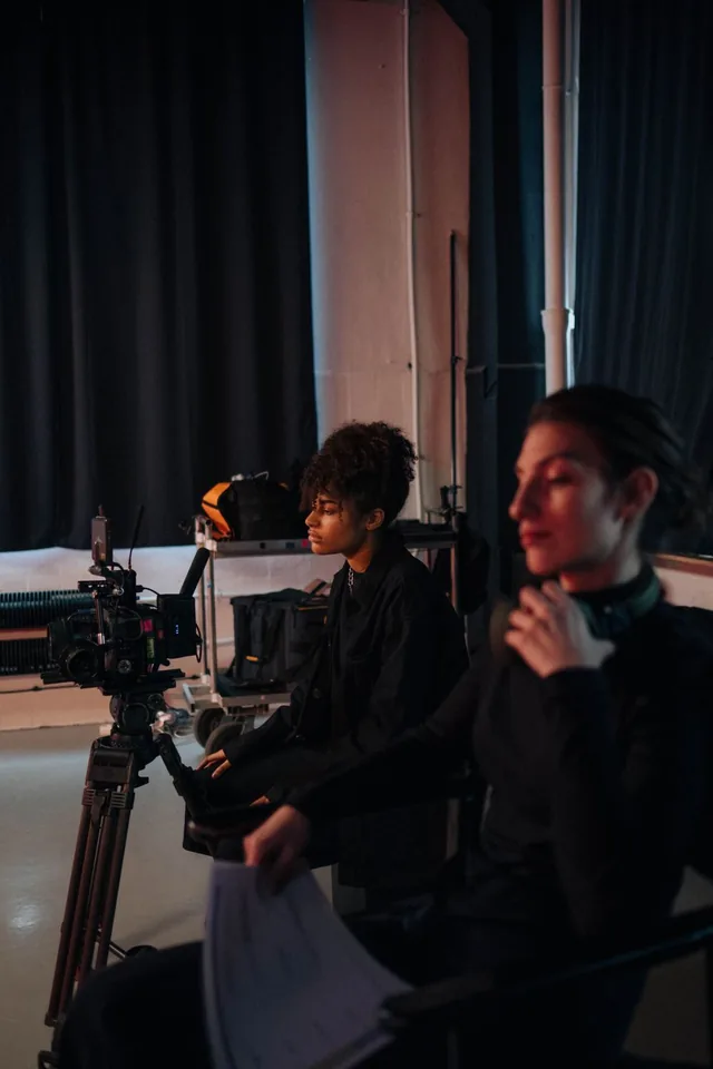 Professional film crew working with a cinema camera